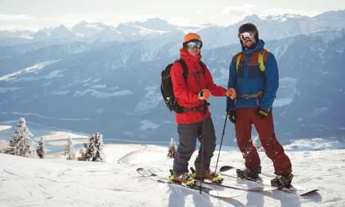 wsi imageoptim 0 two skiers standing together snow covered mountain