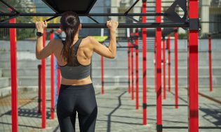 0 strong young woman pulling up on the bar 2021 09 03 14 20 29 utc min scaled
